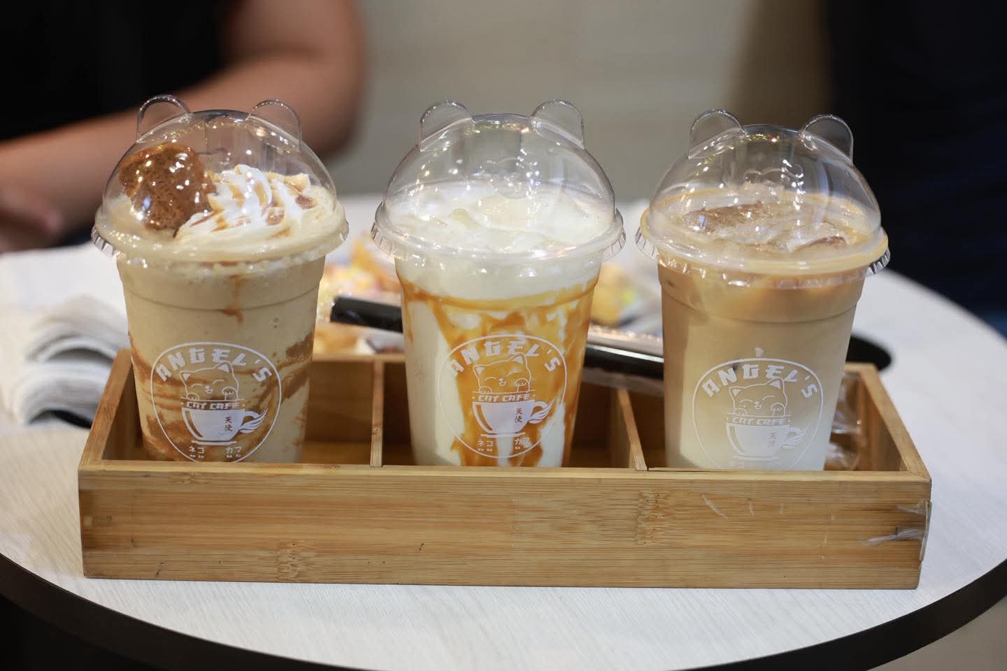 A selection of cat-inspired coffee drinks at Angel's Cat Cafe